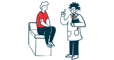 A doctor consults with a patient who's seated on an examining table.