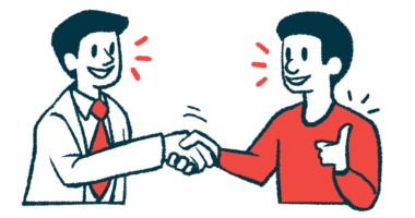 Two people shake hands to show collaboration.