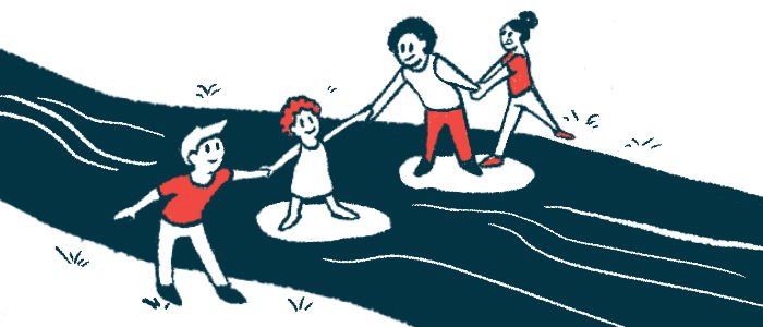 People hold hands to help each other cross a body of water.