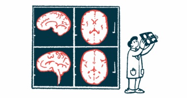 A clinician reviews the results of a brain scan, which is projected on the wall behind him.