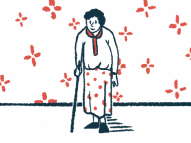 A woman uses a cane while walking.