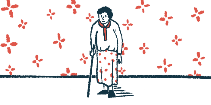 A woman uses a cane while walking.